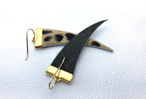 Fur tooth earring with wild cat pattern. 